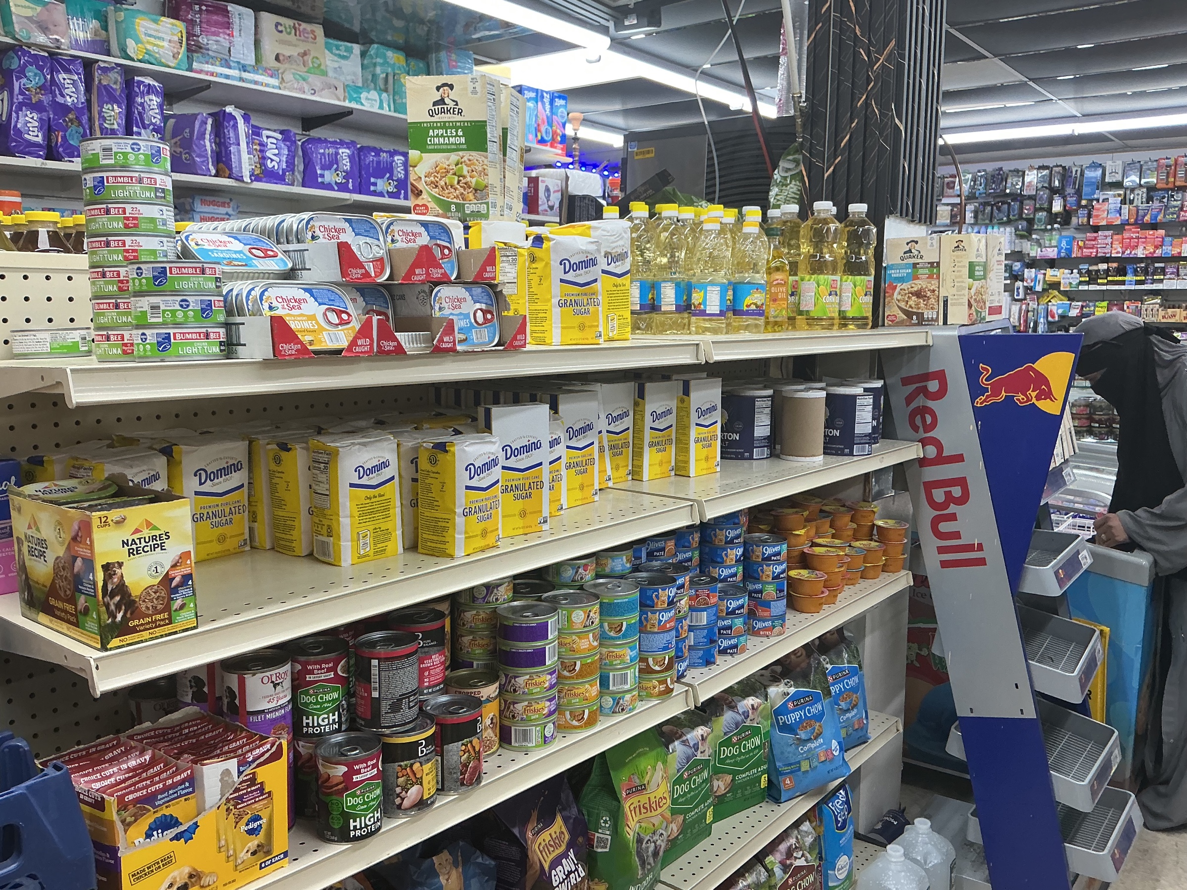 Grocery shelves and everyday essentials at AB Grocery Mart